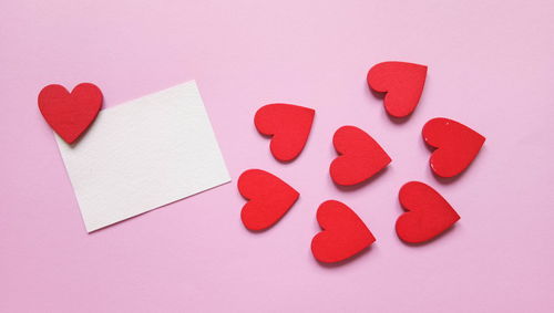 Close-up of heart shape on pink background