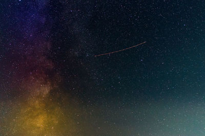 Low angle view of stars in sky at night