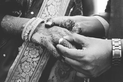 Midsection of woman with hands