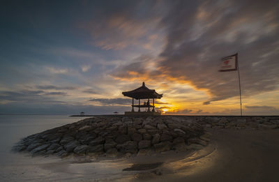 View of beach at sunset