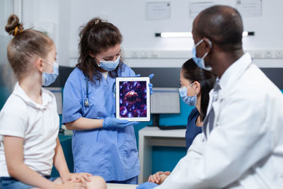 Business colleagues working at clinic