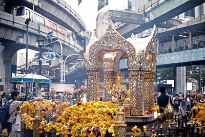 Erawan shrine against bridges