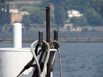 Rope tied up on poles at harbor