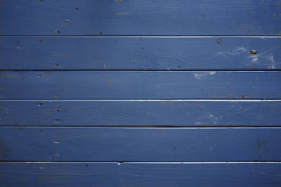 Full frame shot of weathered wooden wall