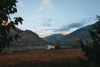 Scenic view of mountains against sky during sunset