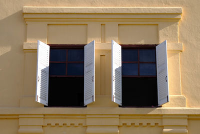 Low angle view of windows on building