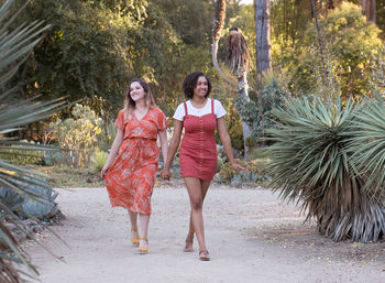 Smiling couple walking on land