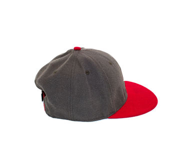 Rear view of person wearing hat against white background