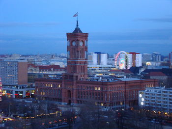 Buildings in city at dusk