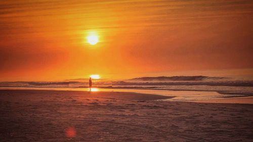 Scenic view of sunset over sea