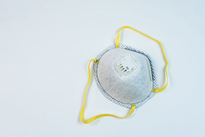 High angle view of clock on white background