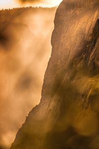 Low angle view of rock formation against sky