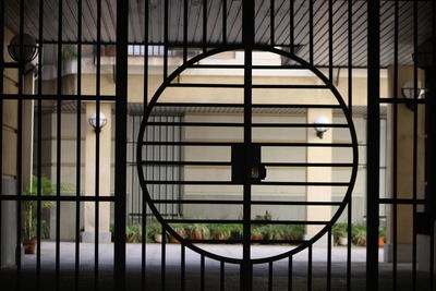 Close-up of metal grate window in building