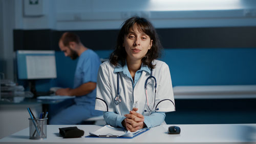 Portrait of businesswoman working at clinic