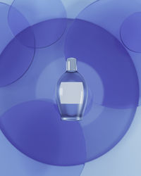 Close-up of glass bottle against white background