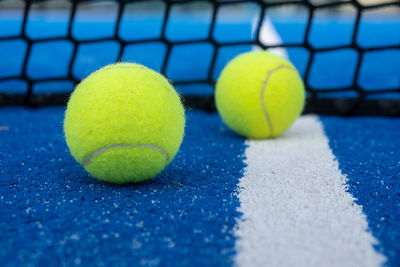 Close-up of tennis ball on playing field