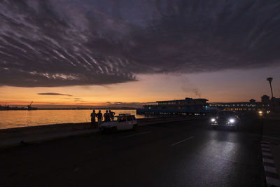 Scenic view of sea against dramatic sky