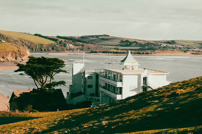 Scenic view of coast against sky