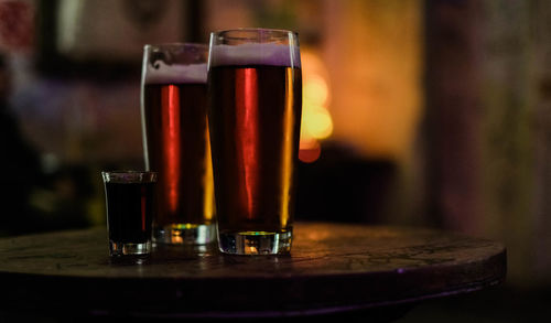 Close-up of beer glass on table