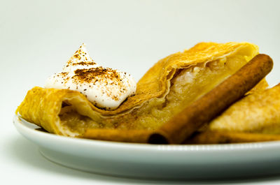 Close-up of fresh bread in plate