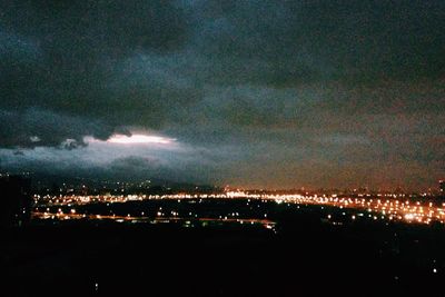 Illuminated cityscape at night