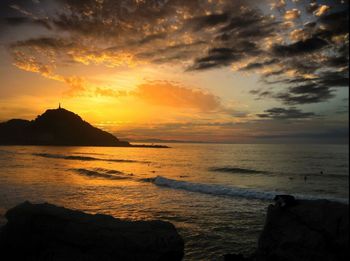 Scenic view of sea against sky during sunset