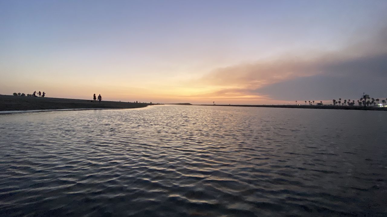 VIEW OF SEA AGAINST CLOUDY SKY