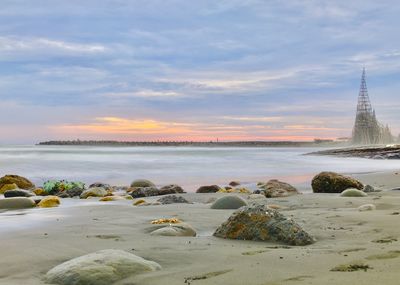 Scenic view of sea against sky during sunset