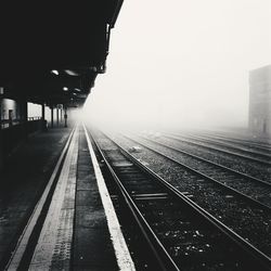 Railroad station against clear sky