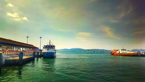 Ship moored at harbor