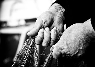 Midsection of person holding net