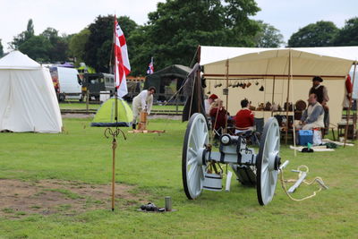 Cannon with people in background