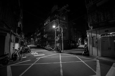 People walking on street at night