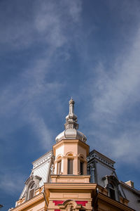 Low angle view of building against blue sky