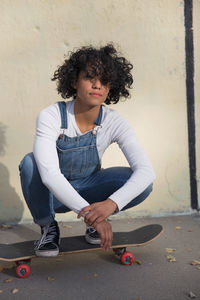 A young woman on a skateboard