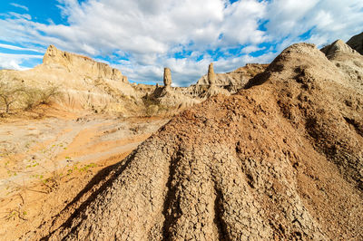 Idyllic shot of rock formations at tatacoa desert against sky