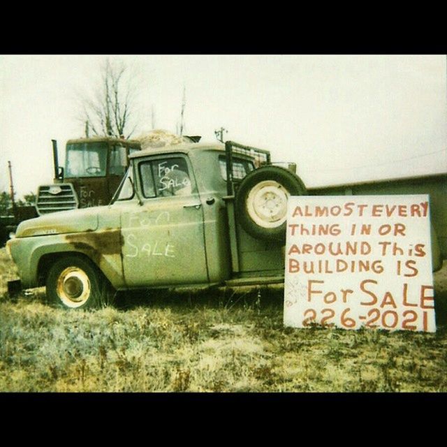 transfer print, transportation, mode of transport, land vehicle, auto post production filter, car, abandoned, obsolete, old, day, building exterior, outdoors, run-down, clear sky, damaged, built structure, no people, field, stationary, architecture