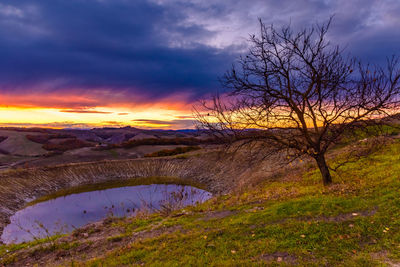 Scenic view of landscape against sky during sunset