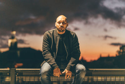 Portrait of man against sky during sunset