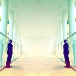 Man standing in corridor