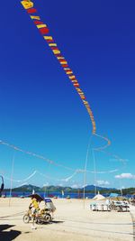 View of nautical vessel against blue sky