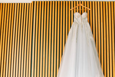 Low angle view of clothes hanging on wall