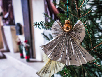 Close-up of christmas decoration hanging on tree