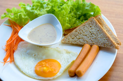 High angle view of breakfast served on table