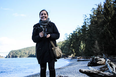 Portrait of man standing in snow