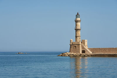 An ancient lighthouse in the port of chania on the island of crete