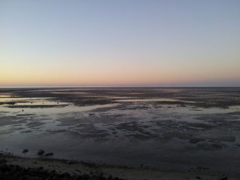 Scenic view of sea against clear sky