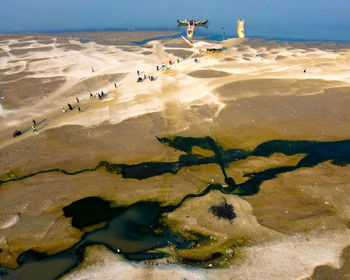 Peoples going into dry river 