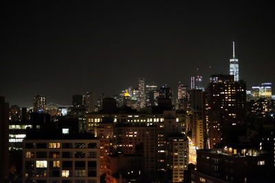 Illuminated cityscape at night