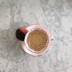 High angle view of coffee cup on table